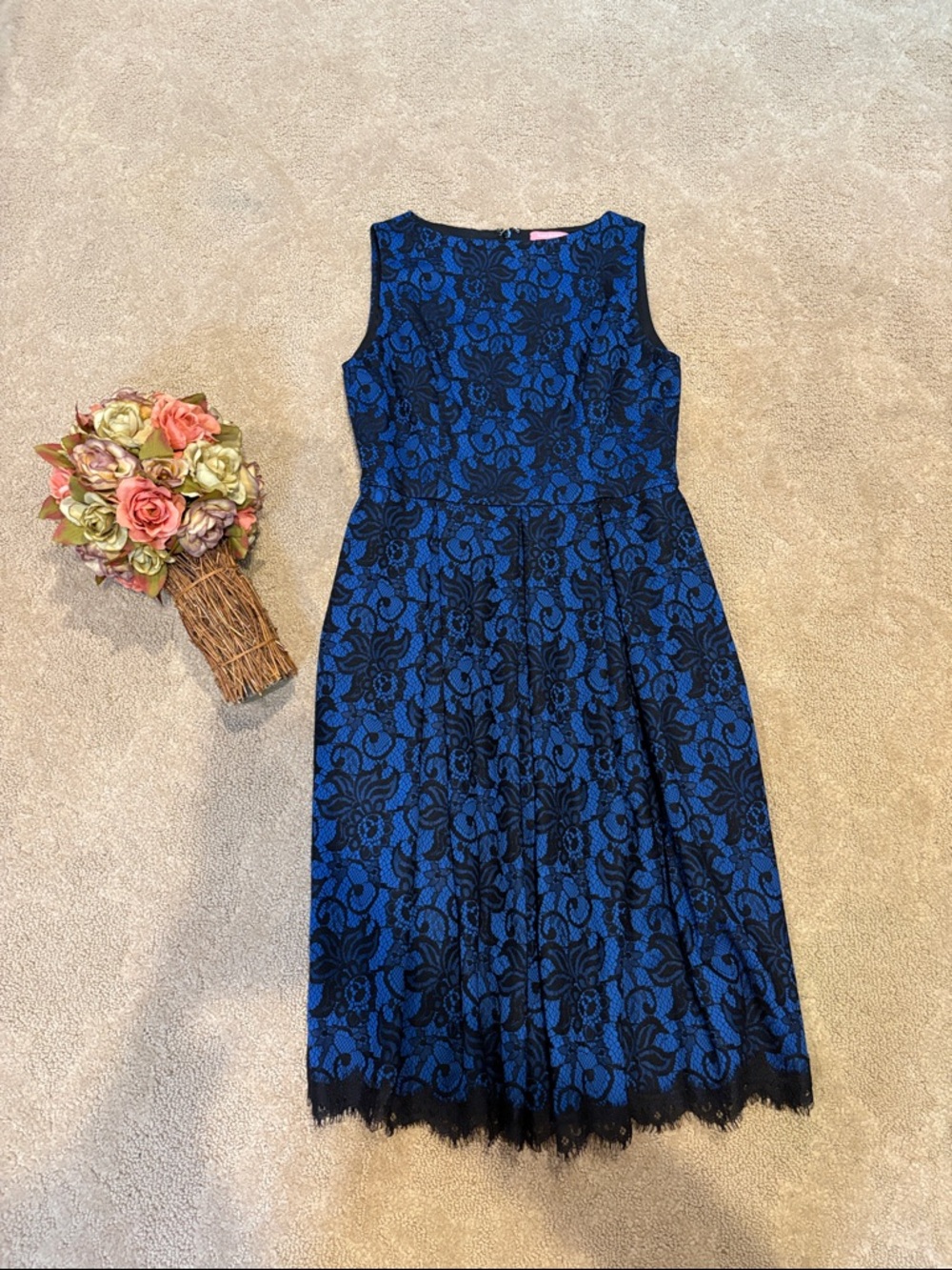 Isaac Mizrachi blue and black lace sleeveless dress.